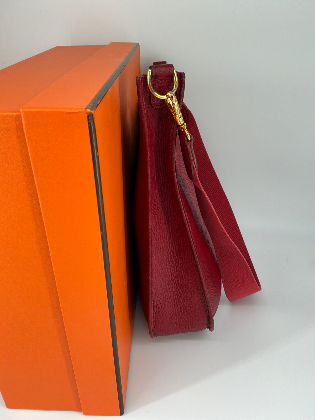 Hermès Evelyne I Clemence Leather Crossbody Bag – Red